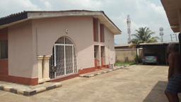4 bedrooms bungalow with 2 living rooms on a plot and half at off ikorodu road
