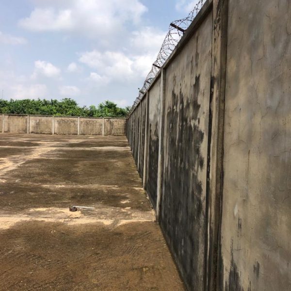 5 plots of land along major road.