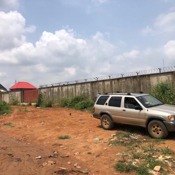 5 plots of land along major road.